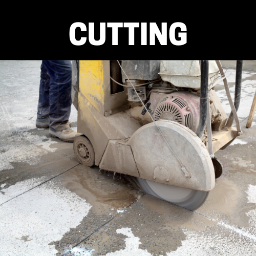 construction worker doing concrete cutting 